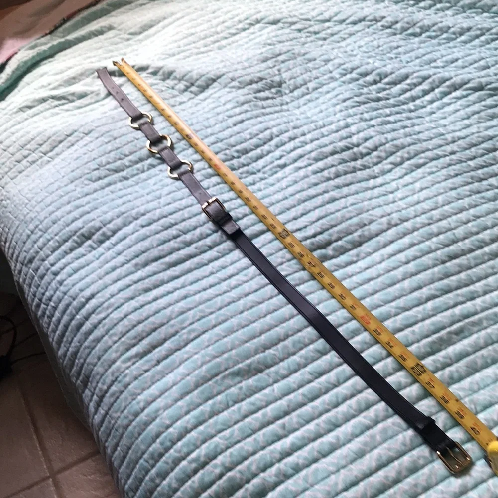 Italian calf hair  And gold link chain belt.